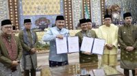 Wali Kota Sungai Penuh Alfin Dan Wali Kota Jambi Maulana Menandatangani Mou Tata Kelola Pemerintah Daerah