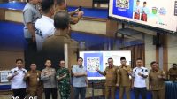 Ketua Dprd Hutri Randa Menghadiri Launching Digitalisasi Legalitas Kotak Amal Sistem Qr Barcode Di Aula Kantor Wali Kota Sungai Penuh