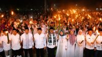 Ketua Dprd Hutri Randa Menghadiri Pawai Obor Tahun Baru Islam 1 Muharram 1448 Hijriah Di Lapangan Merdeka Kota Sungai Penuh